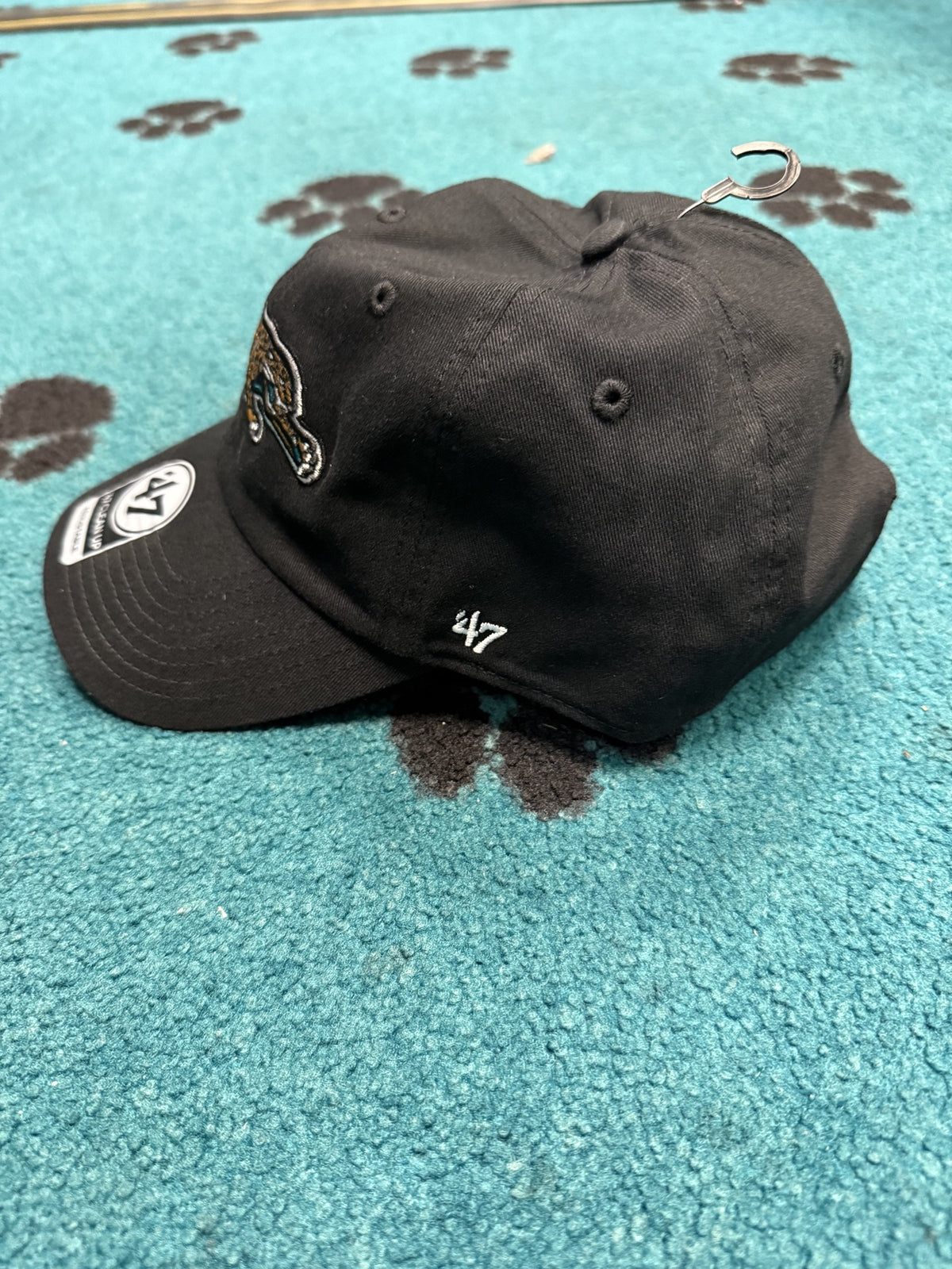 '47 Brand Clean Up adjustable hat in black with the Jacksonville Jaguars Prowler logo, side view
