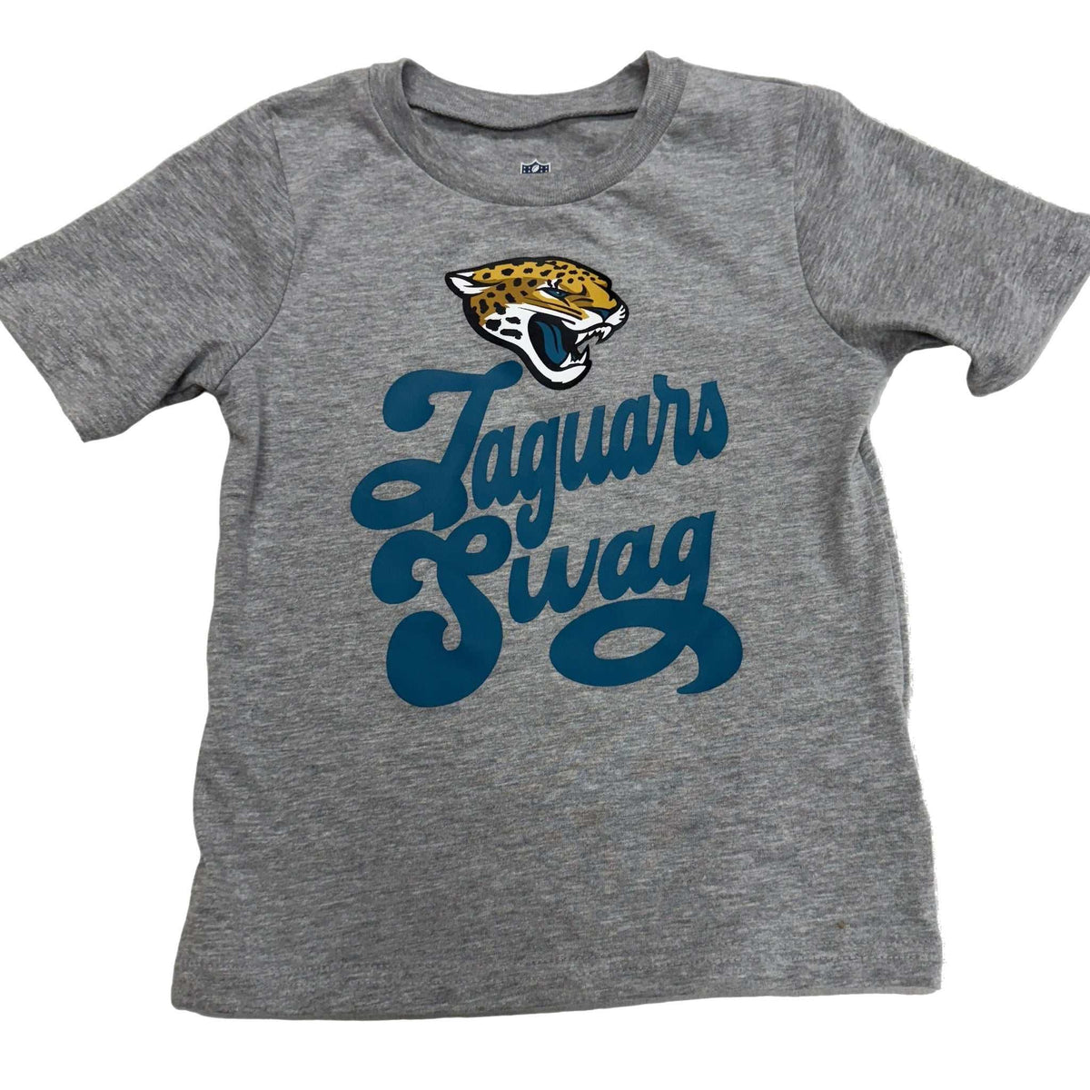 Toddler wearing gray Jacksonville Jaguars T-shirt showcasing team pride