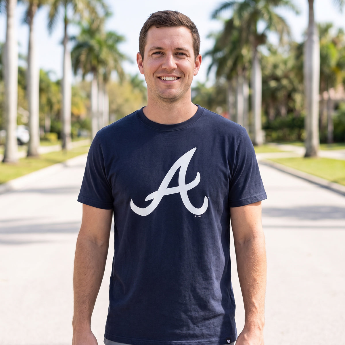 Atlanta Braves '47 Imprint Franklin tee worn on a palm-lined Florida street