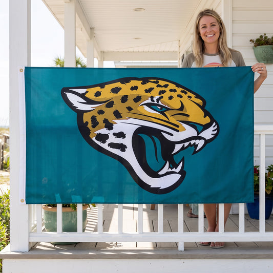 NFL Jacksonville Jaguars WinCraft Teal Deluxe Flag 3 x 5 Foot - on-model lifestyle photo