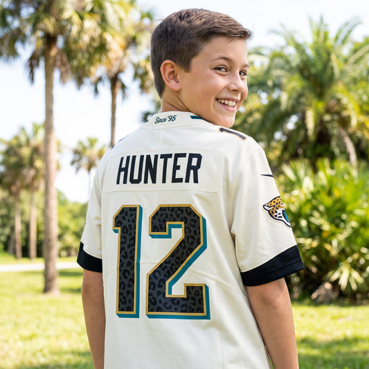 NFL Jacksonville Jaguars Nike Youth Travis Hunter Rivalry Game Jersey - on-model lifestyle photo