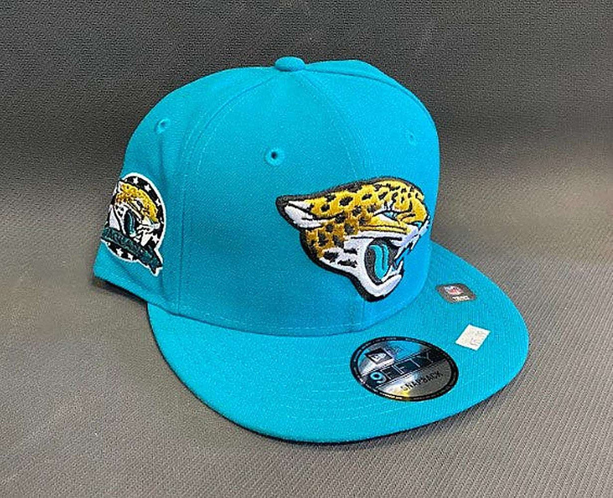 Teal Jacksonville Jaguars low profile 9FIFTY snapback cap with team logo and sidepatch