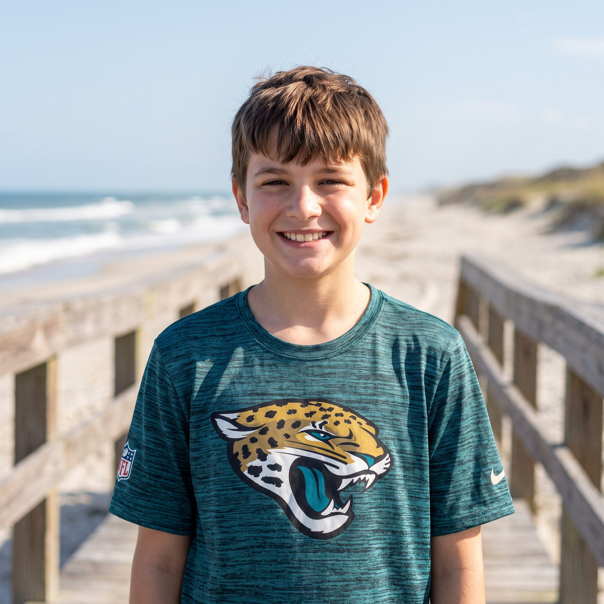 NFL Jacksonville Jaguars Nike Youth Rivalry Velocity Short Sleeve Tee - on-model lifestyle photo