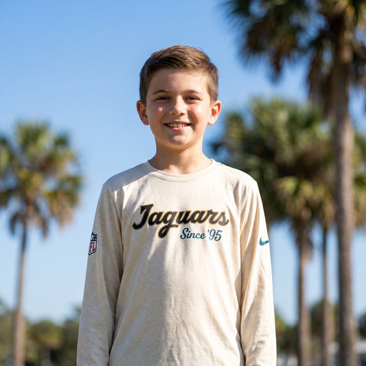 NFL Jacksonville Jaguars Nike Youth Rivalry Dri-FIT Long Sleeve Legend Tee - on-model lifestyle photo