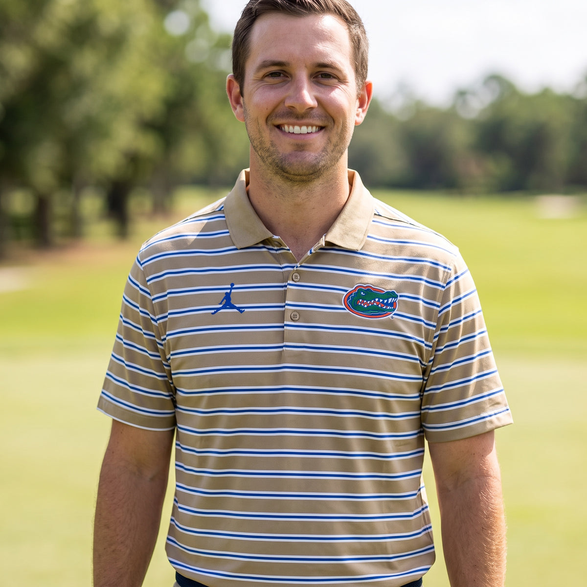 Florida Gators Jordan Striped Primary Logo polo worn on a golf course