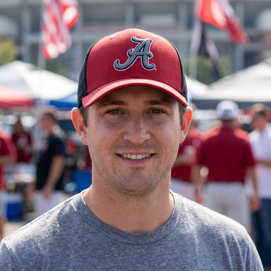 Alabama Zephyr Pivot hat worn at a tailgate